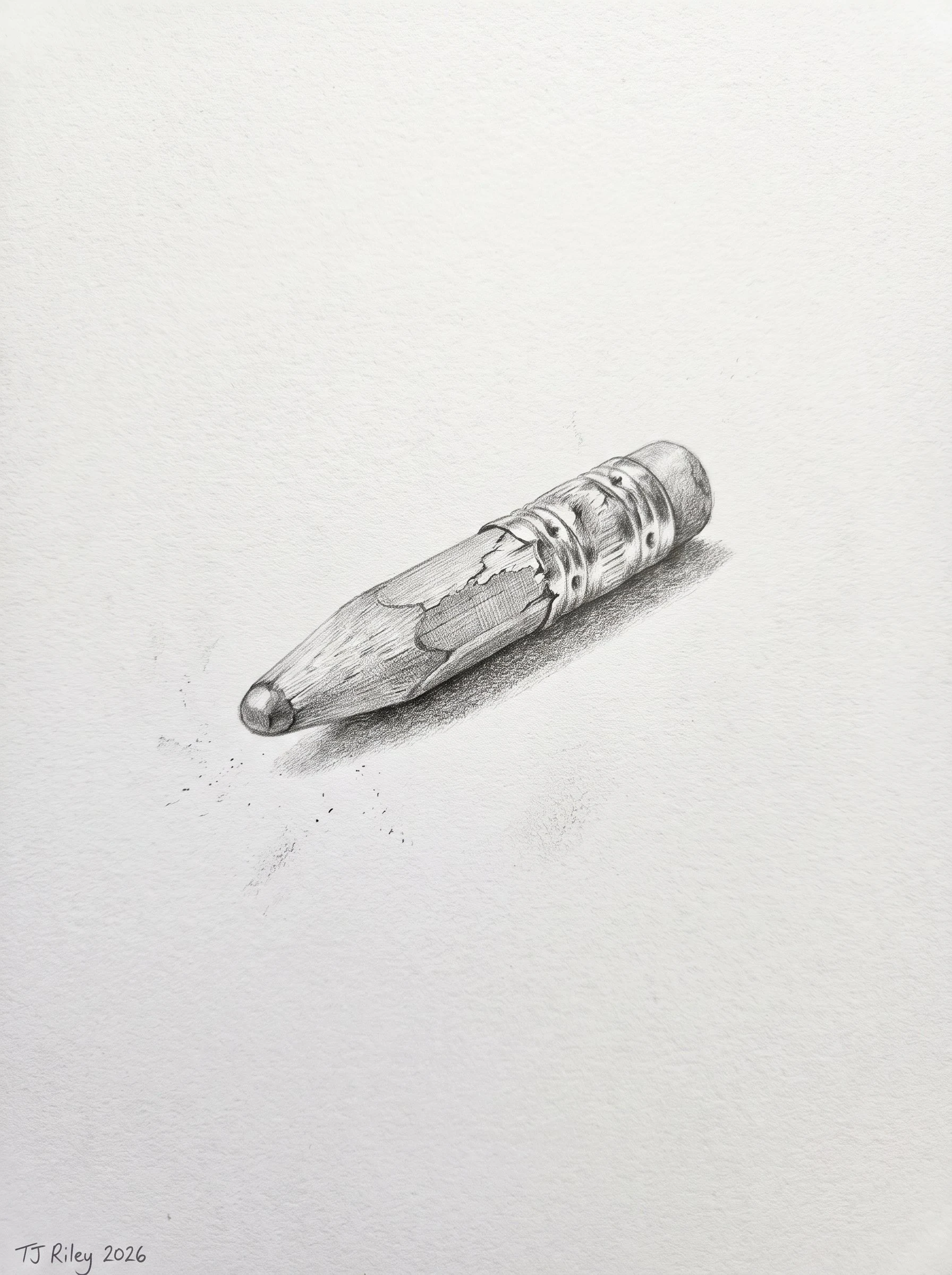 A pencil worn to a stub: cracked wood, dented ferrule, rounded tip.